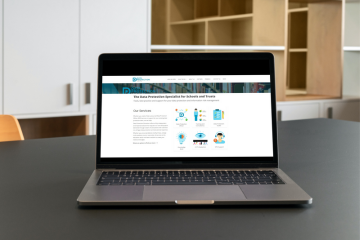 Laption on a desk with the DPE Knowledge Bank on the screen